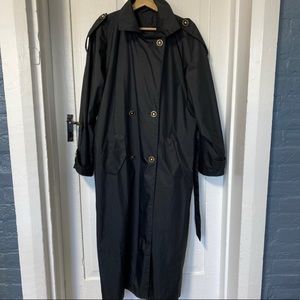 Good used condition. Black Long trench coat size 8
but please look at measuremen